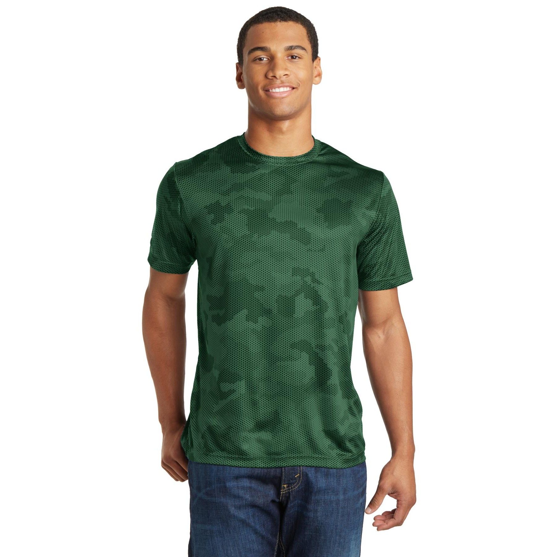 A man is wearing a green t-shirt and jeans.