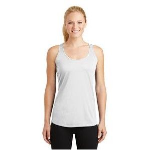 A woman is wearing a white tank top and black pants.
