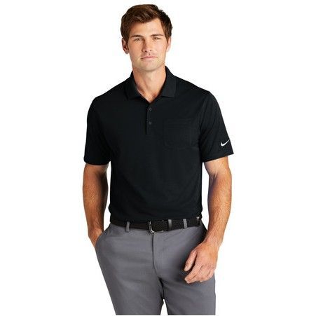 A man wearing a black nike polo shirt and grey pants