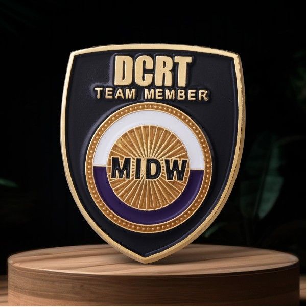 A badge that says dcrt team member on it