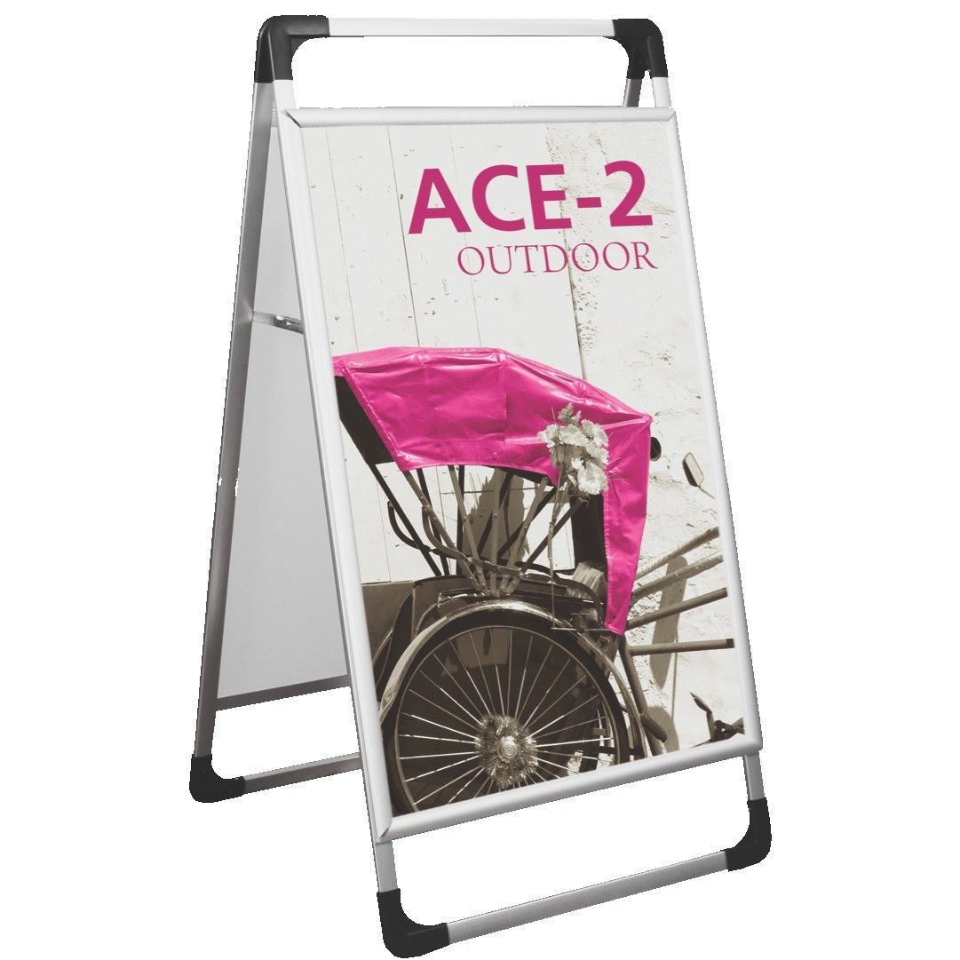 A sign with a picture of a horse drawn carriage on it.