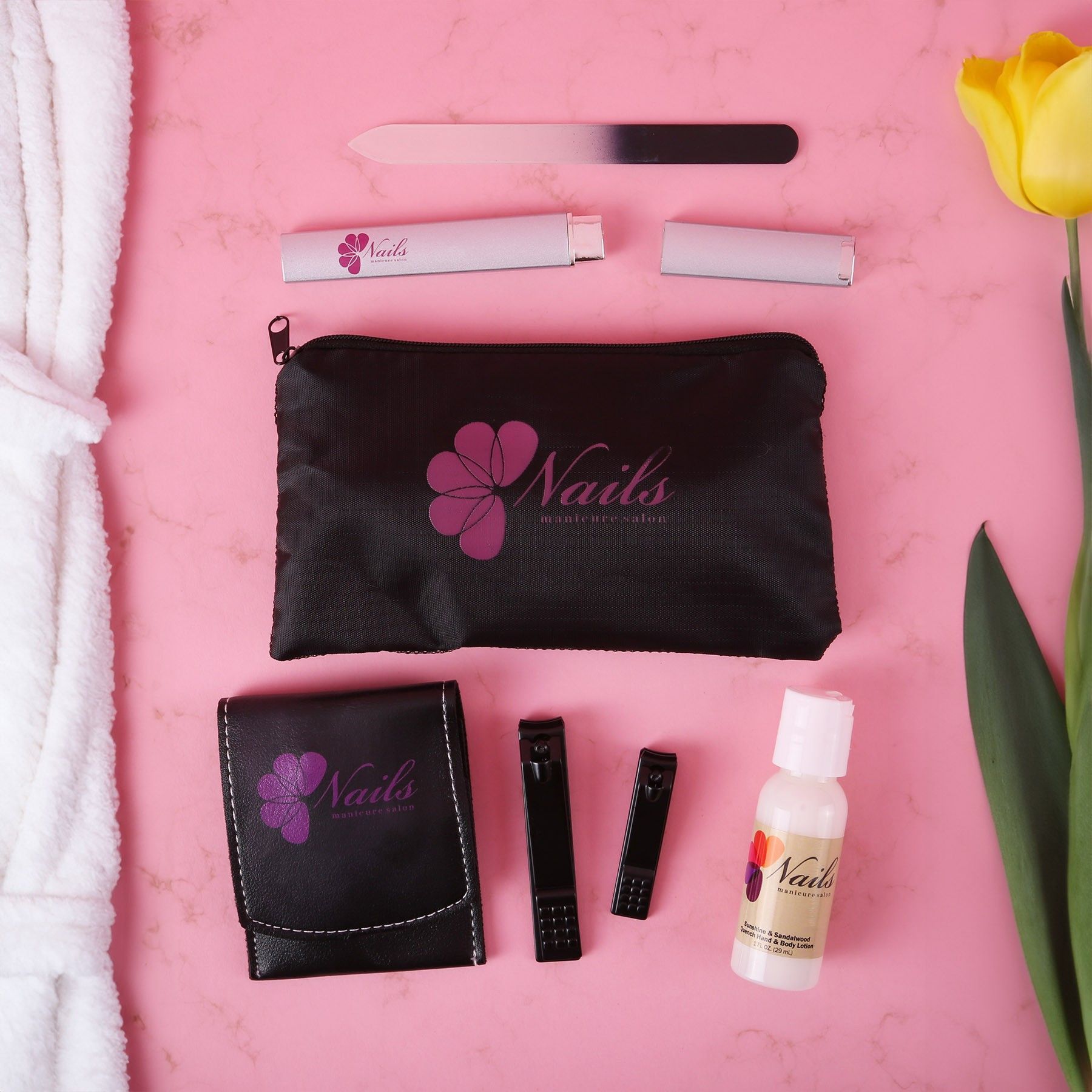 A black bag with the word nails on it
