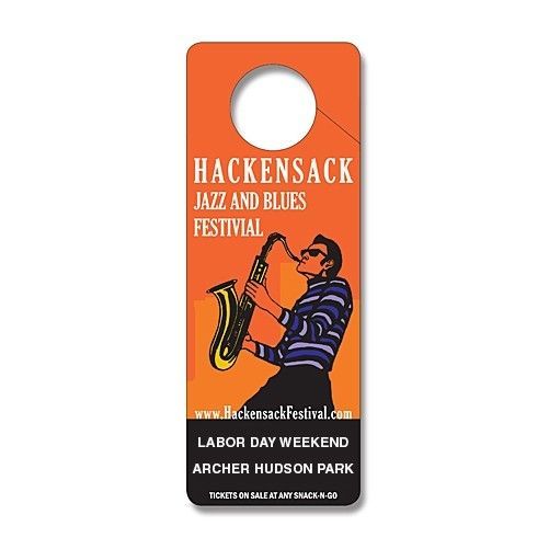 A man is playing a saxophone at the hackensack jazz and blues festival.