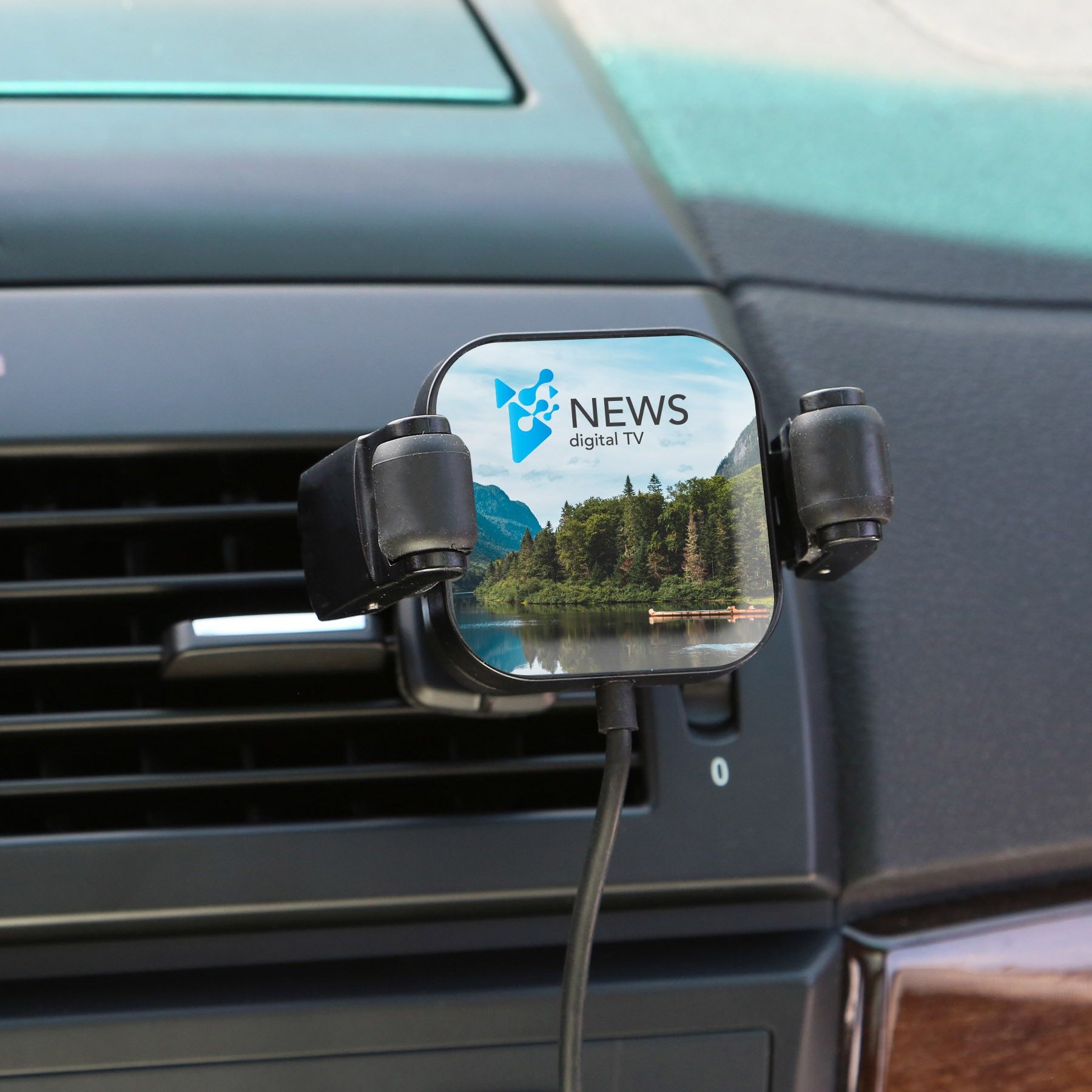 A cell phone holder with the word news on it