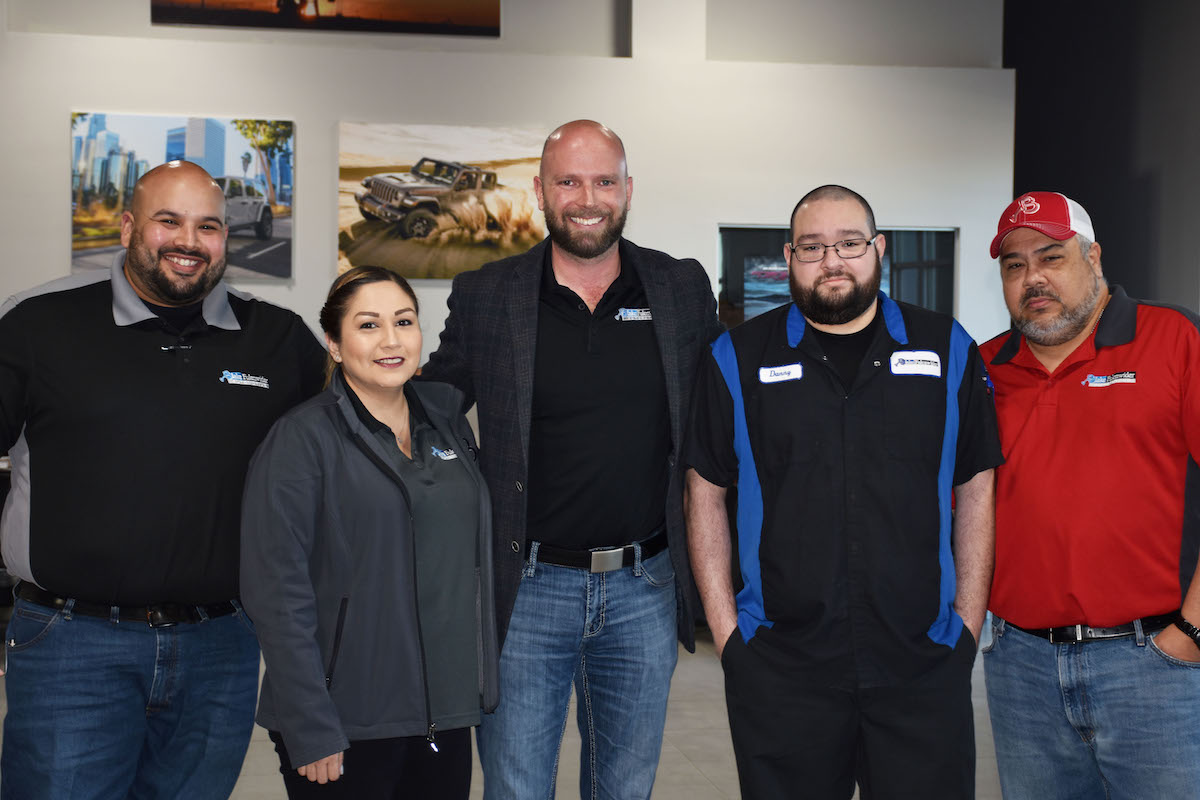Man sitting at desk with laptop 