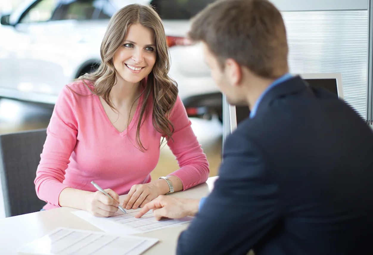 woman at dealership