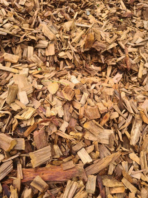 Pile of Hardwood Chips — Campbell's Truck and Bobcat and Landscape Supplies In Gympie, QLD
