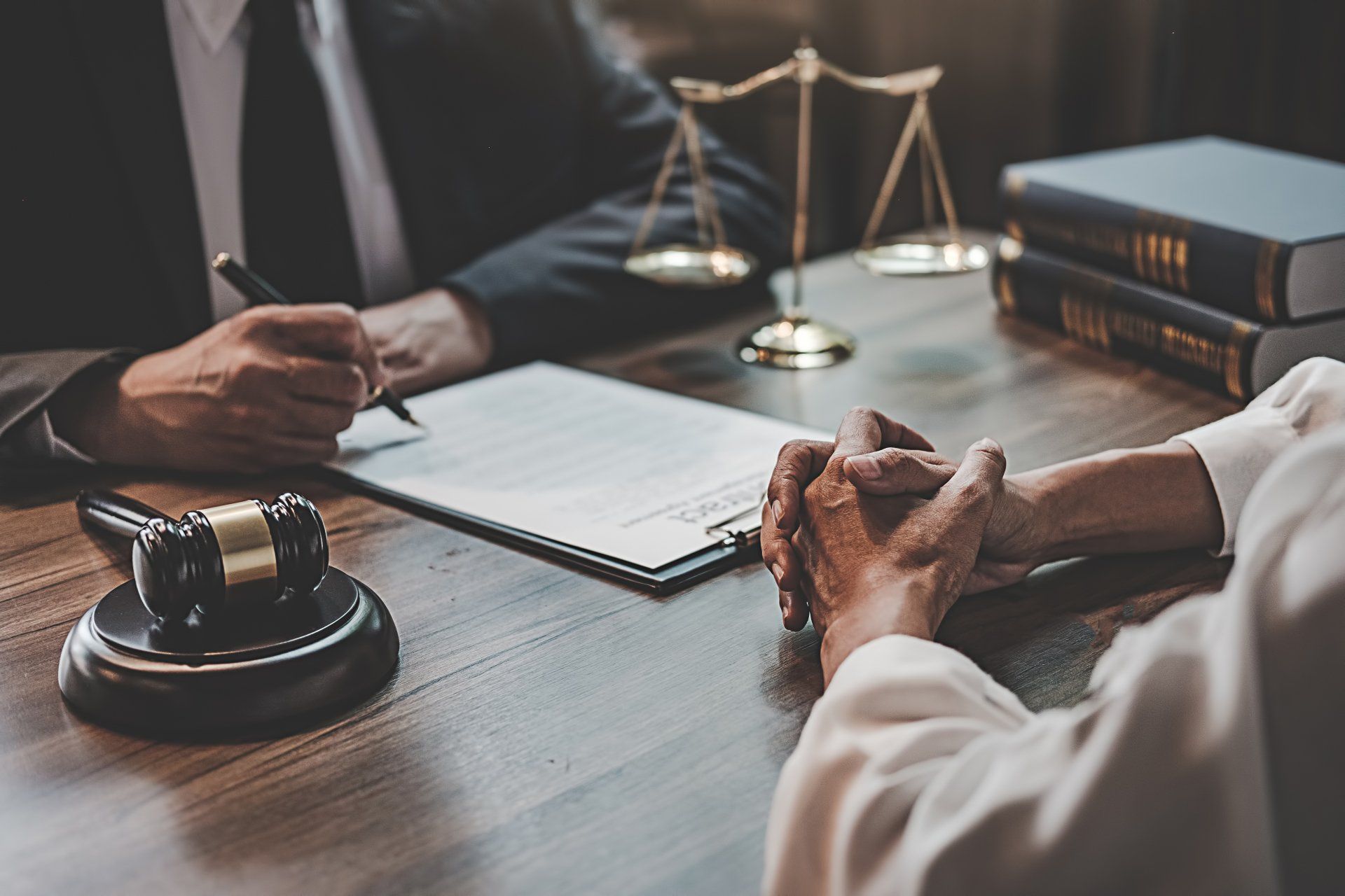 Judge gavel with Justice lawyers having team meeting at law firm background