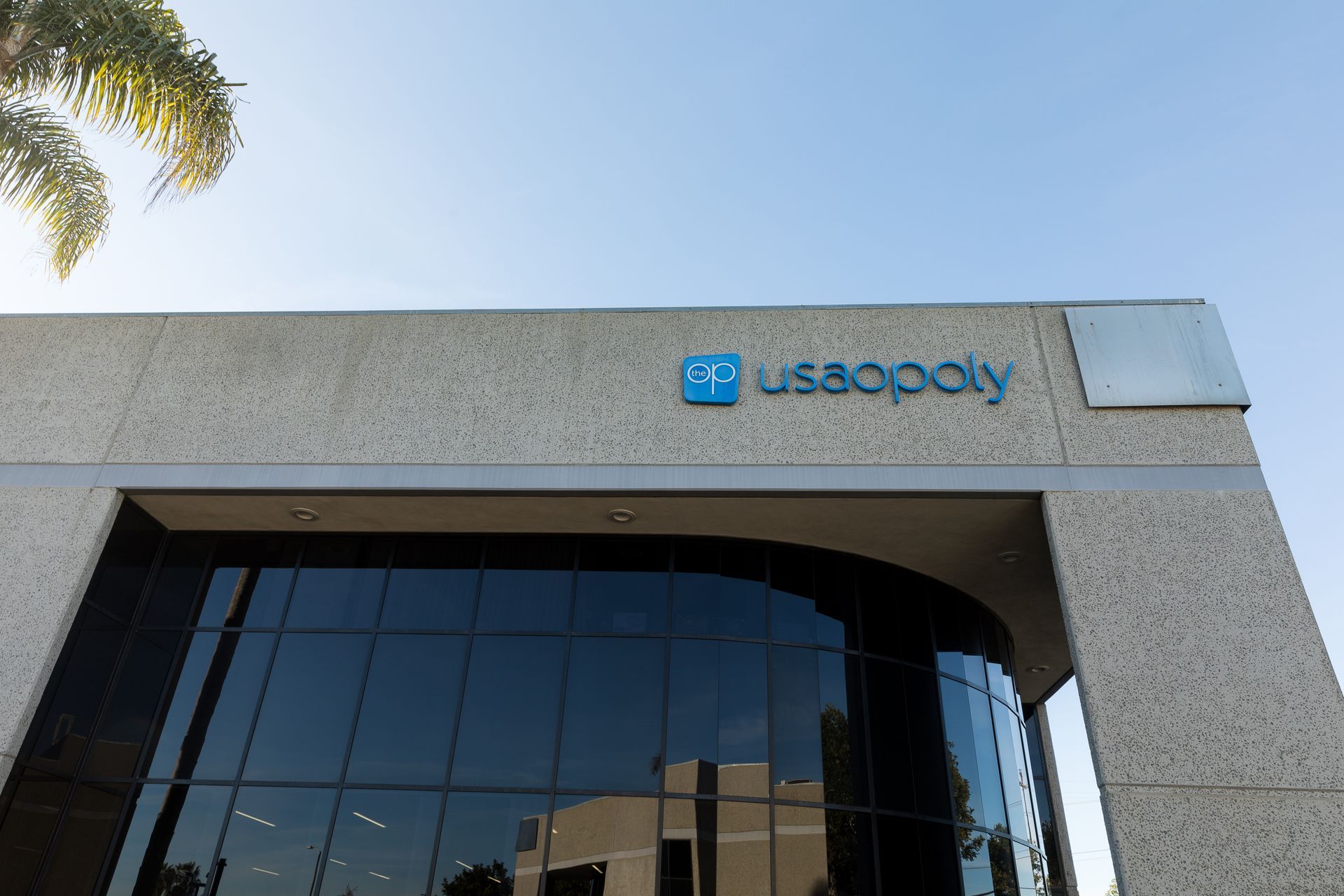 Usapoly is written on the side of a building