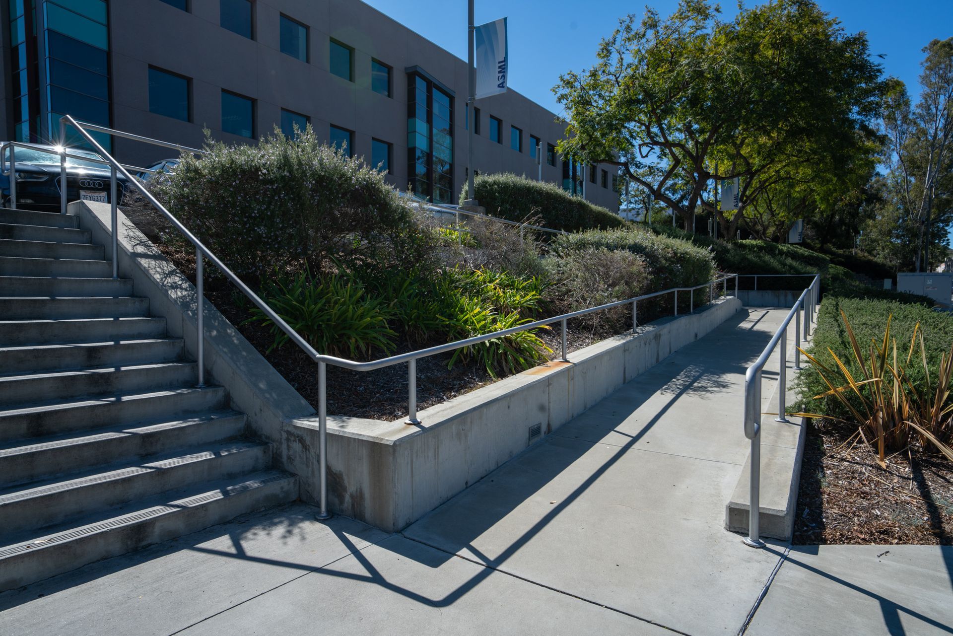 A set of stairs leading up to a building with a railing.