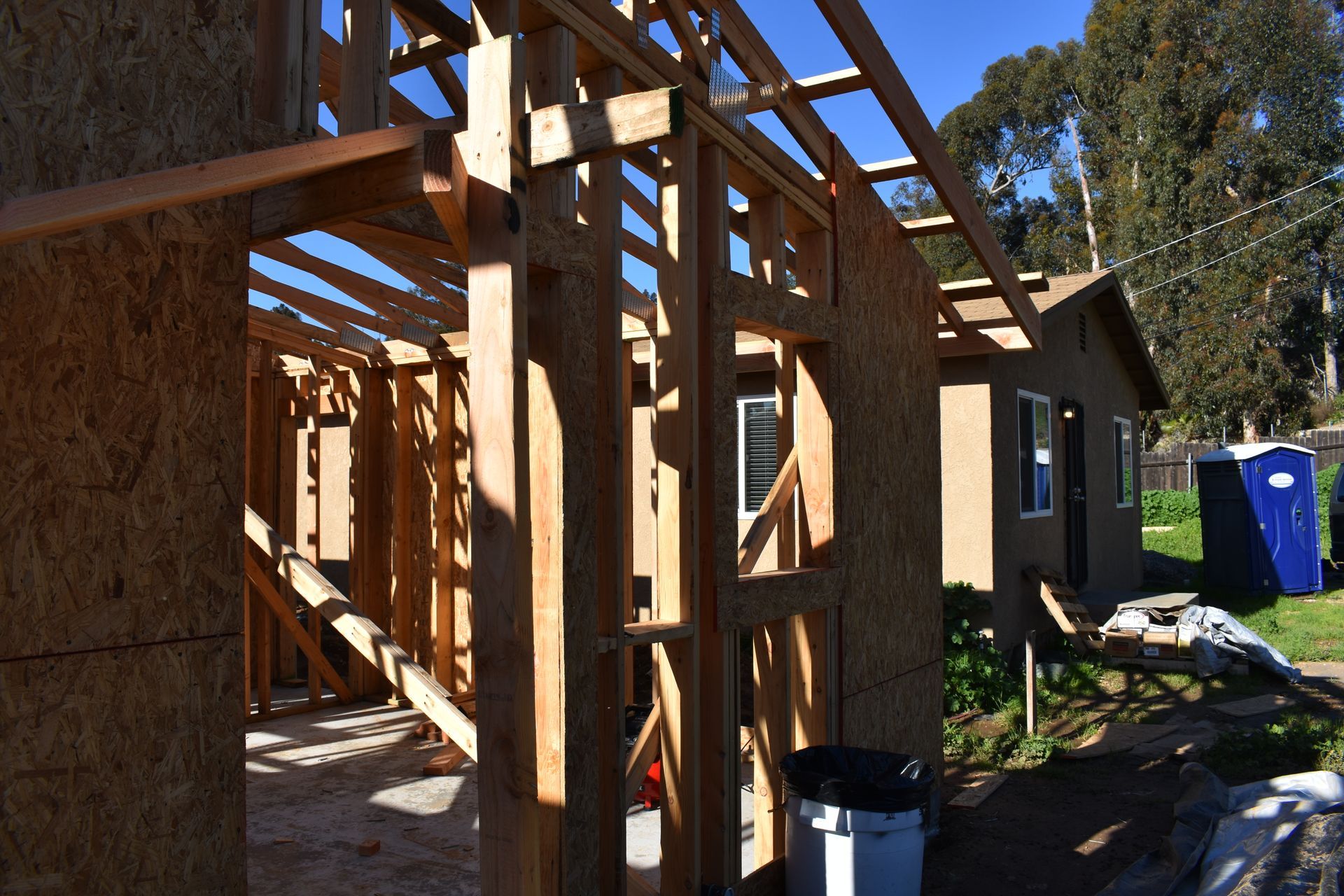 A house that is being built with wooden beams