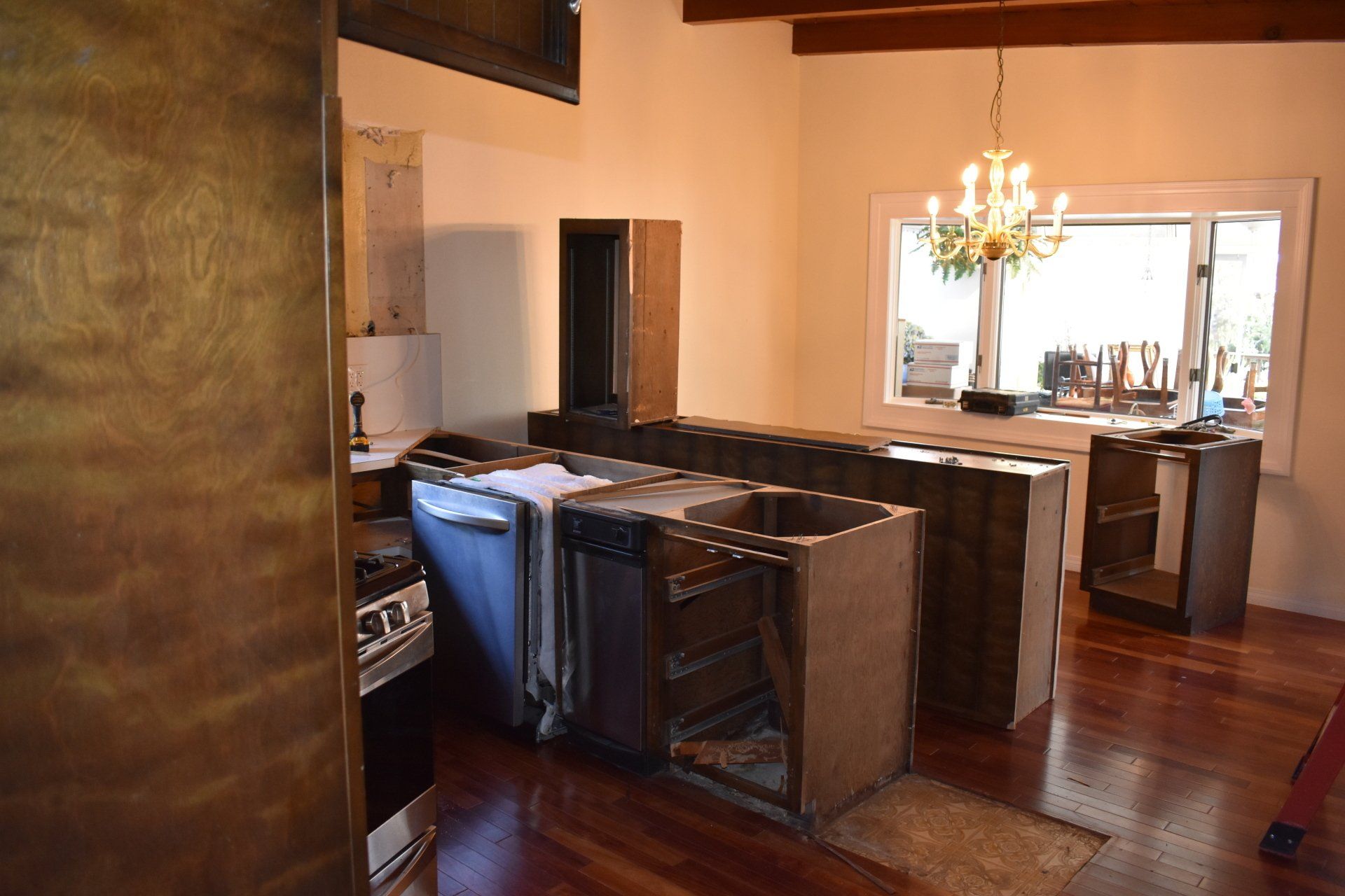 A kitchen with a lot of cabinets and a sink