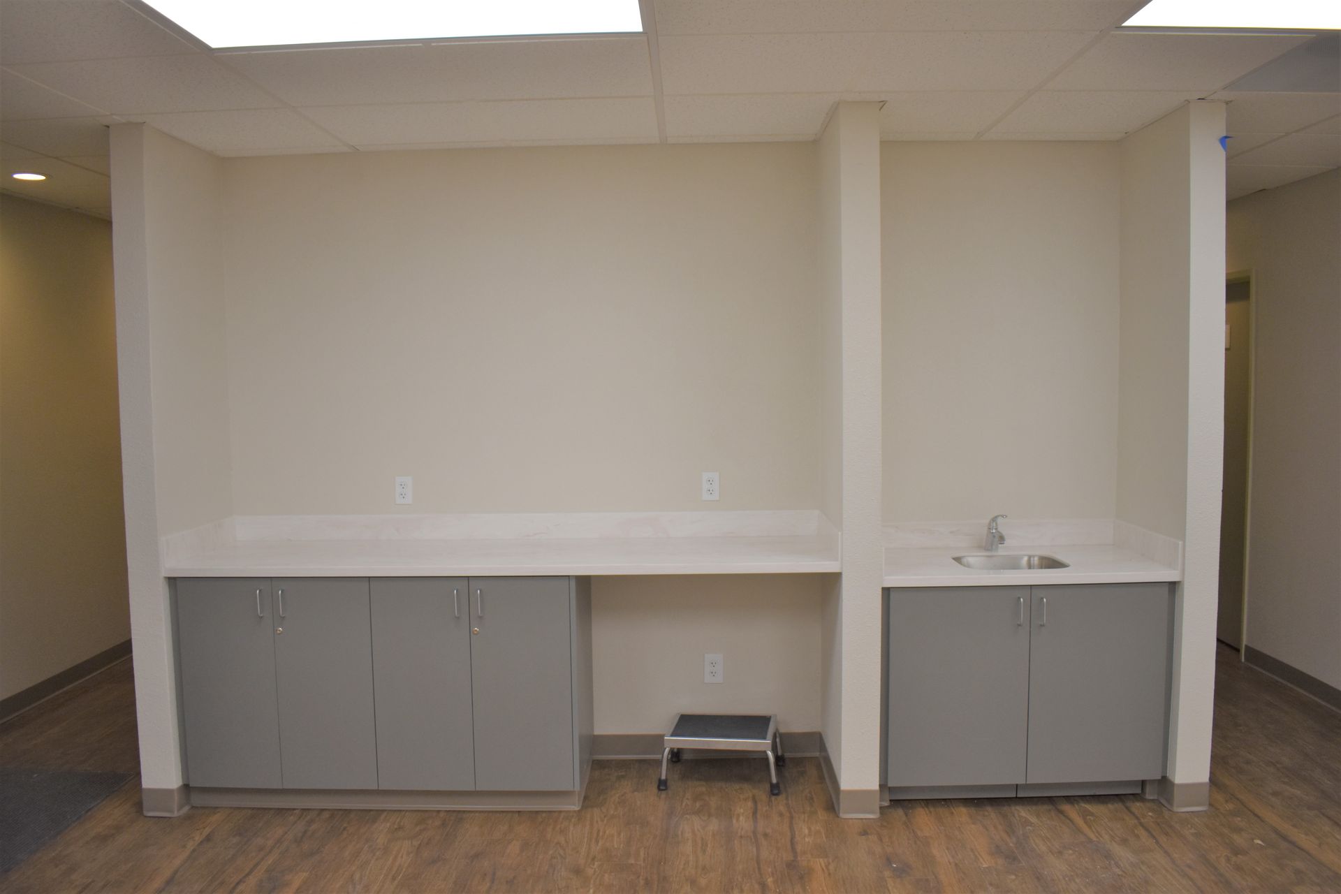 There is a sink in the middle of the room.