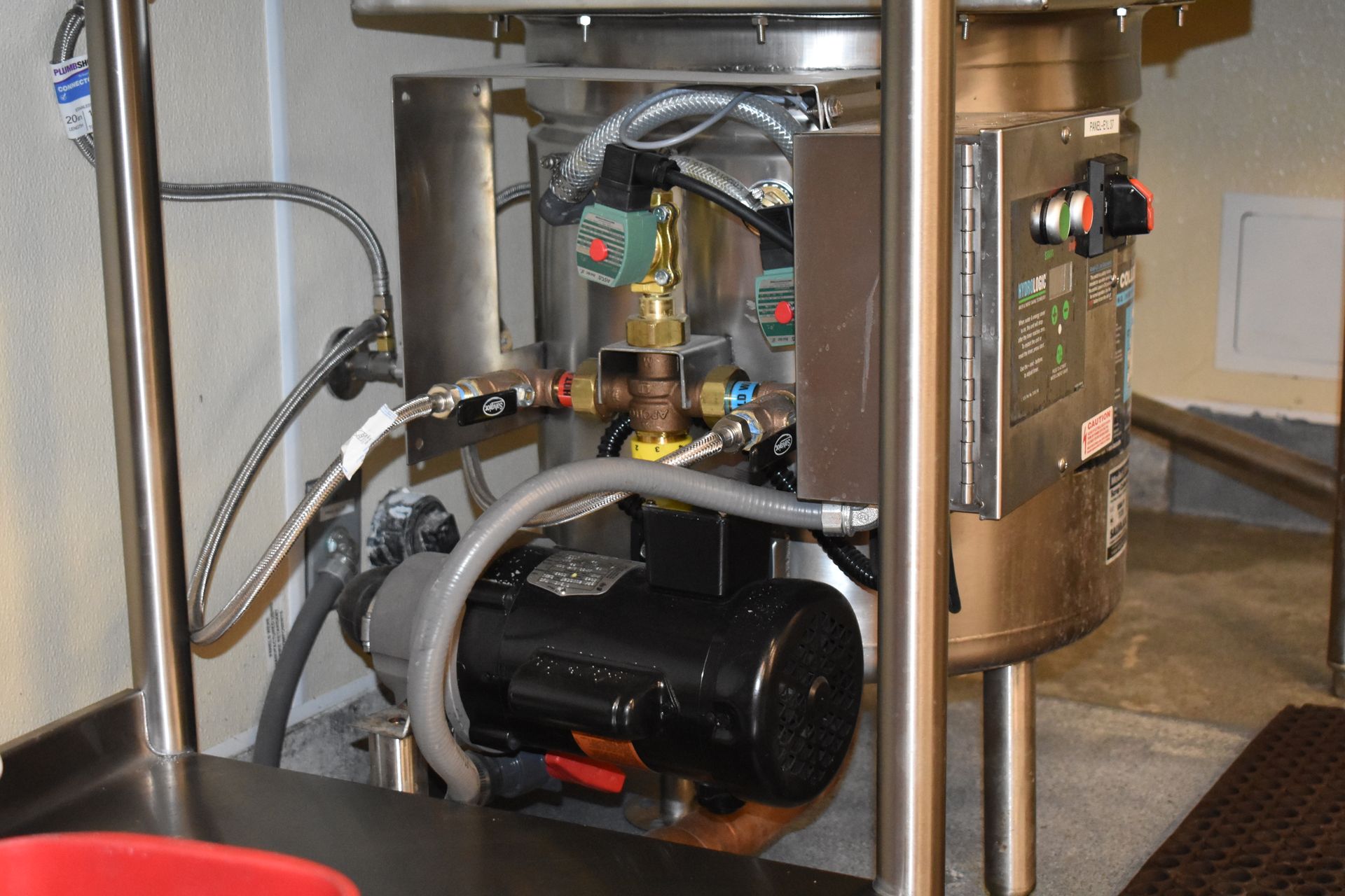 A machine with a motor and a hose attached to it