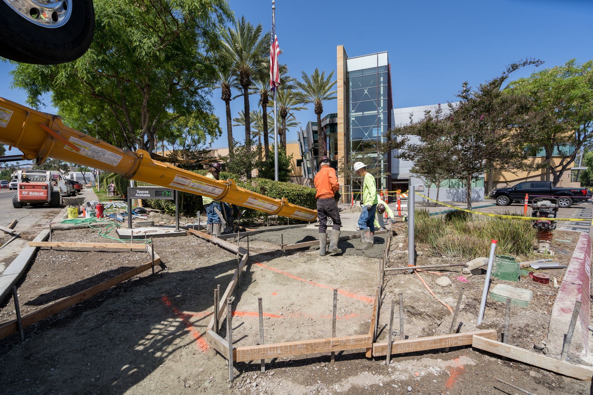 A group of construction workers are working on a construction site.