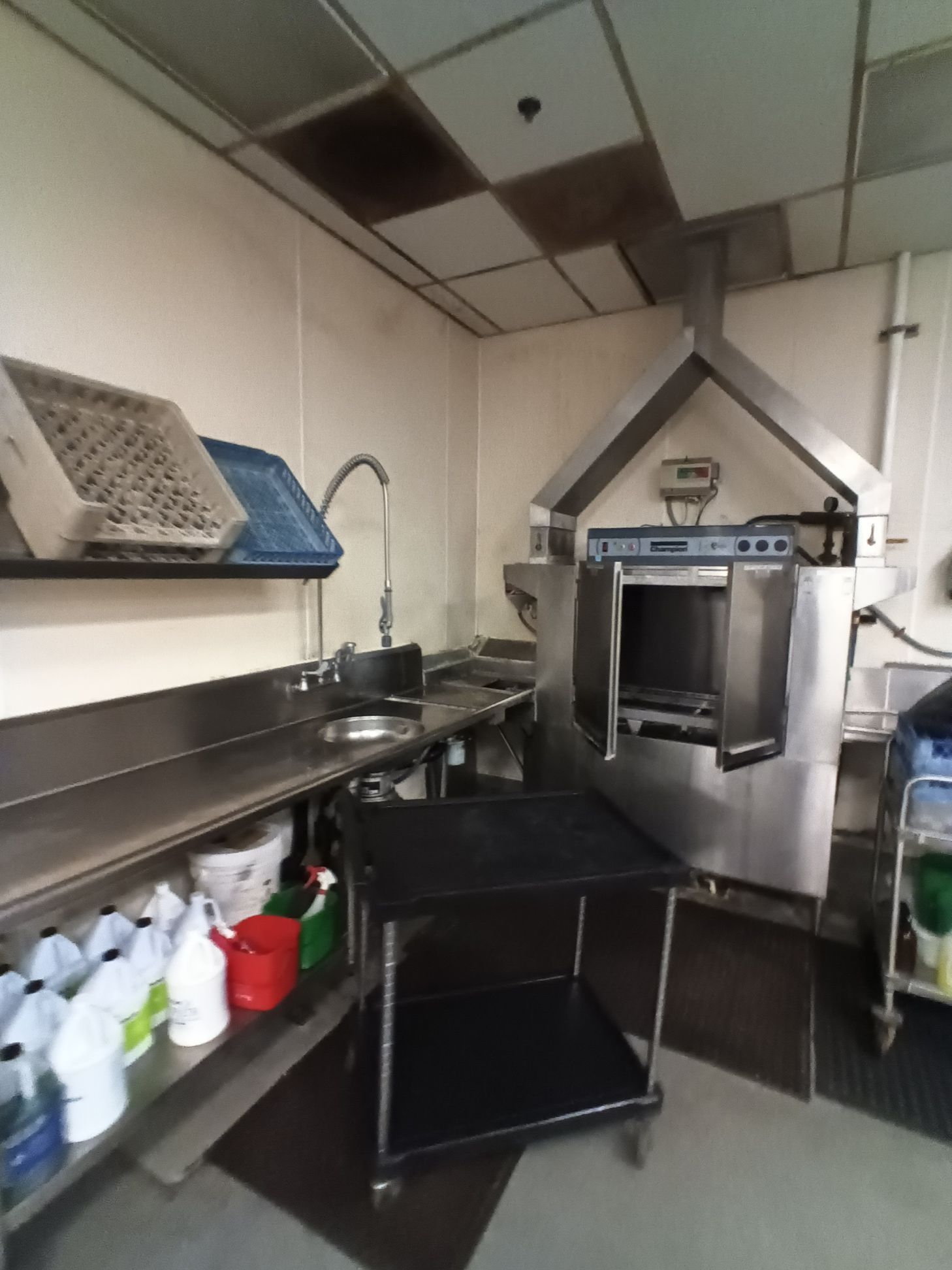 A kitchen with stainless steel appliances including a dishwasher