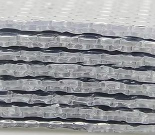 Stack of silver, textured insulation material.