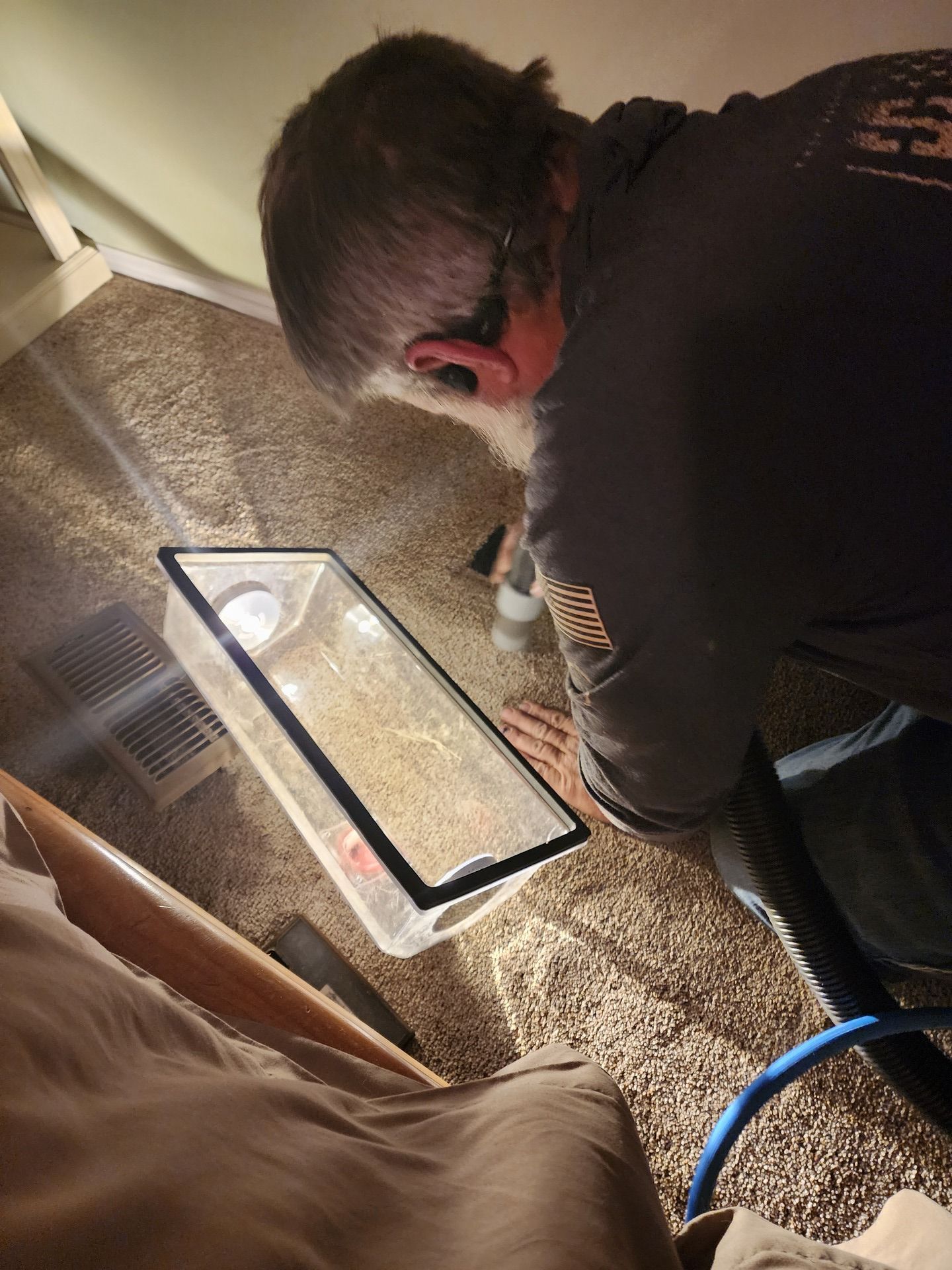 Air duct cleaning contractor using equipment for residential air duct cleaning services