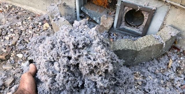 Lint buildup removed by dryer vent cleaning company to reduce fire risk and improve airflow
