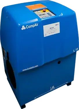 A blue air compressor is sitting on a white surface.