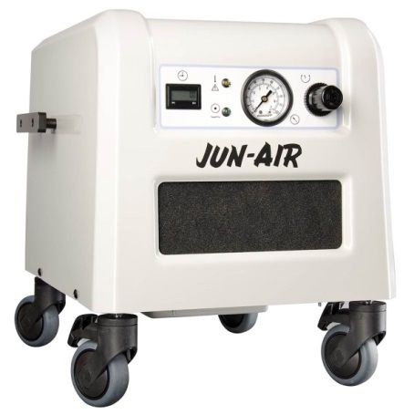 White Jun-Air air compressor on wheels with a pressure gauge, digital display, and control knob.