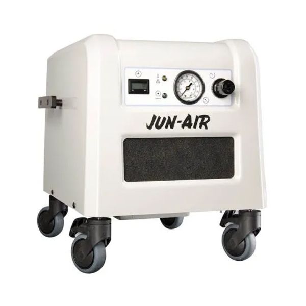 White Jun-Air portable air compressor on wheels with gauges and control panel