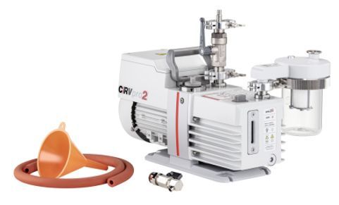 White and grey Welch vacuum pump with attached accessories, a funnel, and hoses.