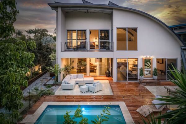 Modern coastal villa with pool near the beach in Byron Bay — luxury holiday rental by Intrepid BnB.