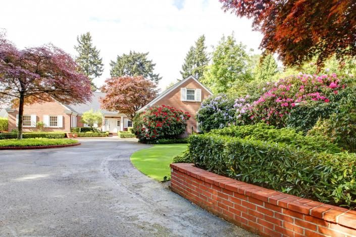 brick retaining wall along driveway