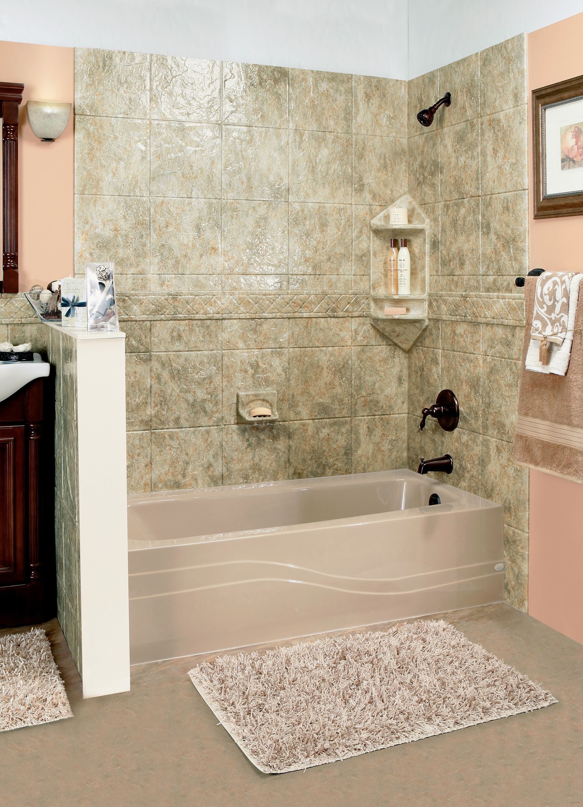 Bright modern bathroom with gray vanity, tiled shower, bathtub, and a plant by the window