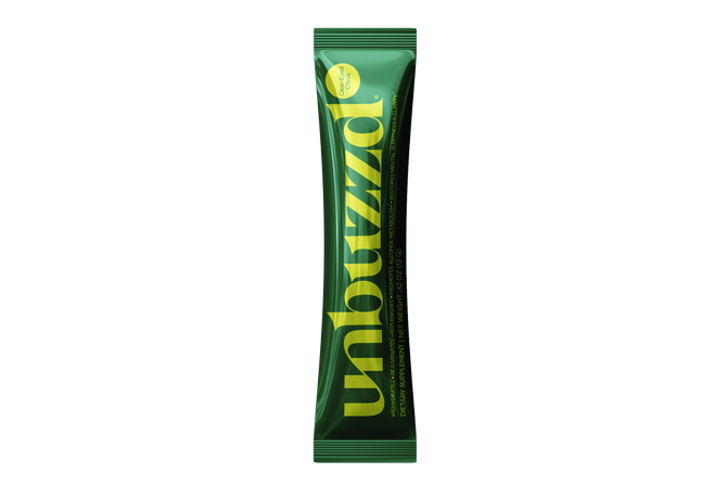 A green packet of unbuzzd is on a white background.