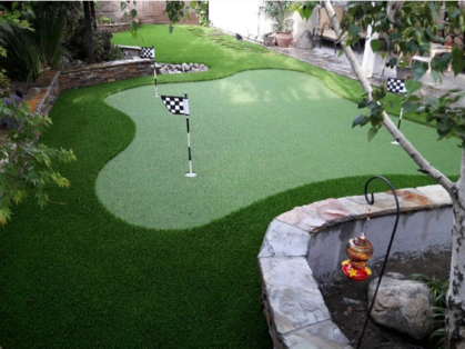 3 hole putting green with flags
