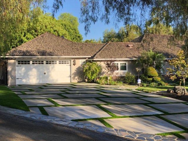 Imagine driving onto this beautiful driveway! driveway with artificial turf and pavers in Hacienda Heights