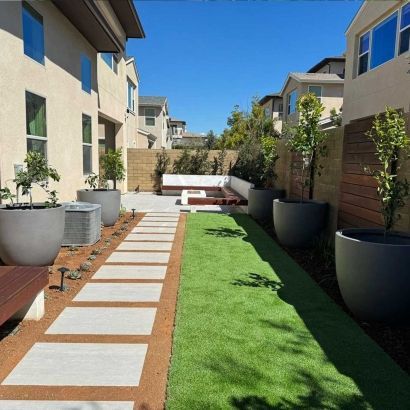 decomposed granite and pavers next to artificial grass
