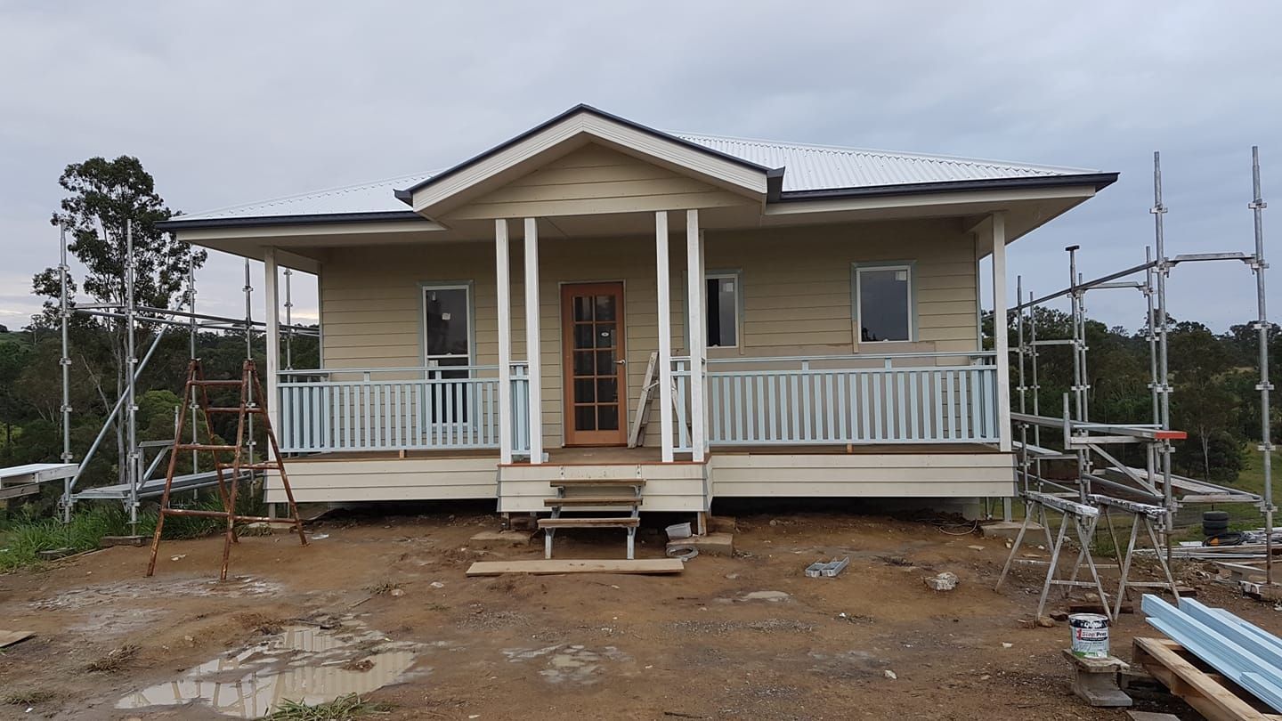 Front View Of The House With Scaffolding Around It — Builder In Gympie, QLD