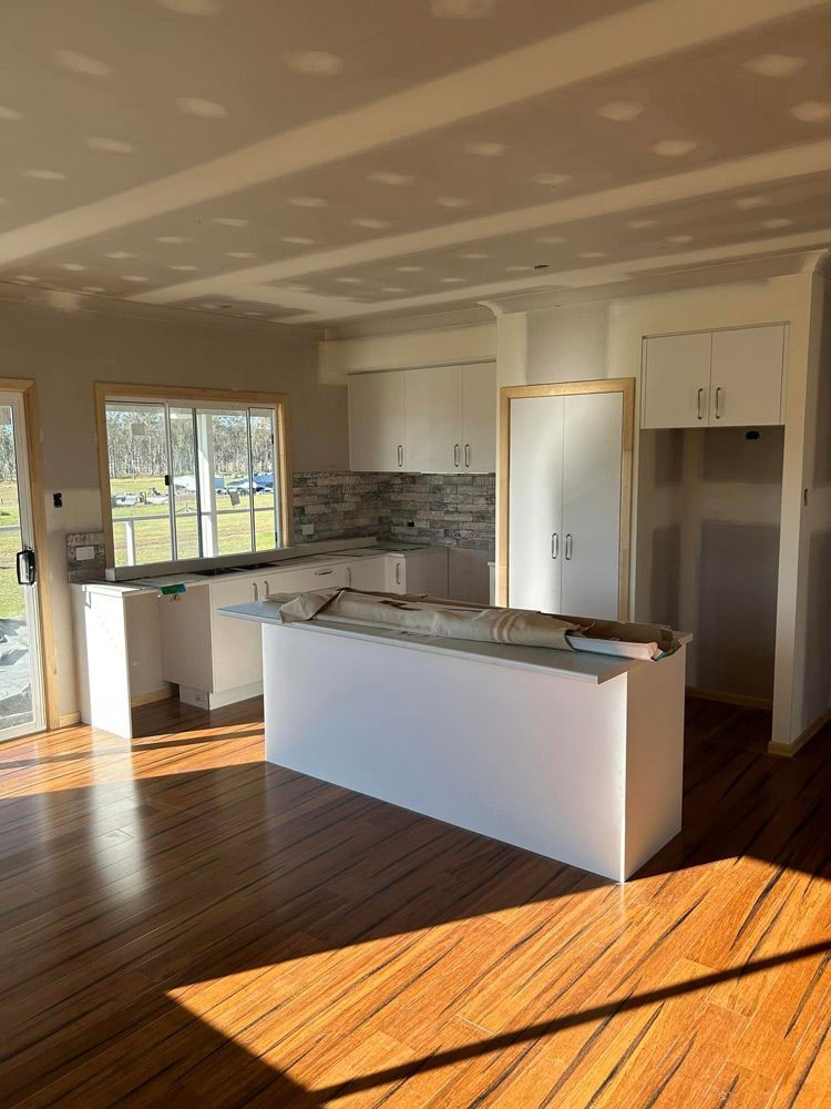 Charming Kitchen Featuring Elegant Cabinets on The Classic Queensland Homes website — Builder In Maryborough, QLD