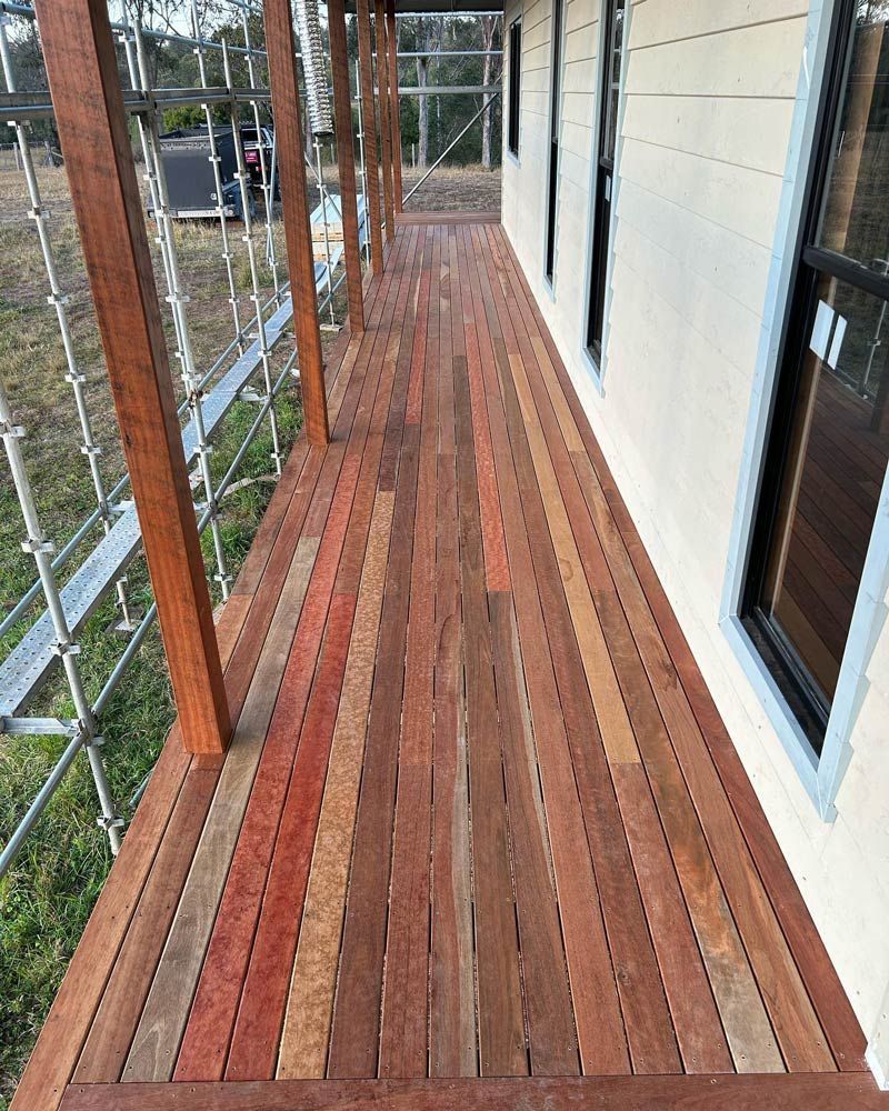 Wooden Walkway Leading To A House With Scaffolding — Builder In Gympie, QLD