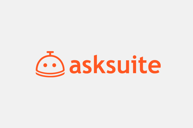 Asksuite logo: Orange text and icon of a smiling robot-like head.