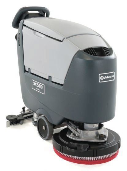 A sc580 floor scrubber with a red brush