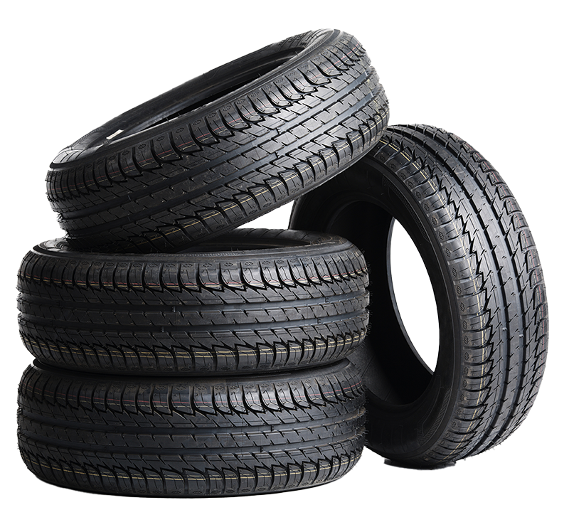Four tires are stacked on top of each other on a white background