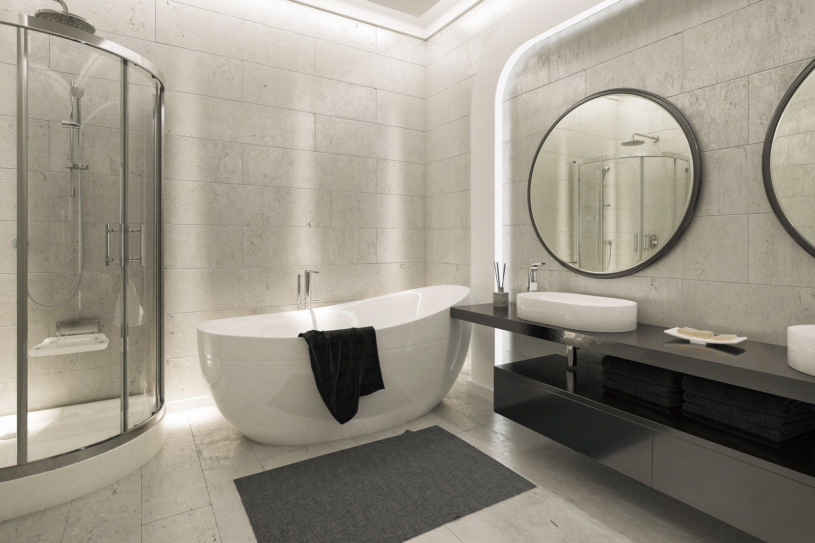 Modern bathroom with a glass shower, soaking tub, and dual sinks.