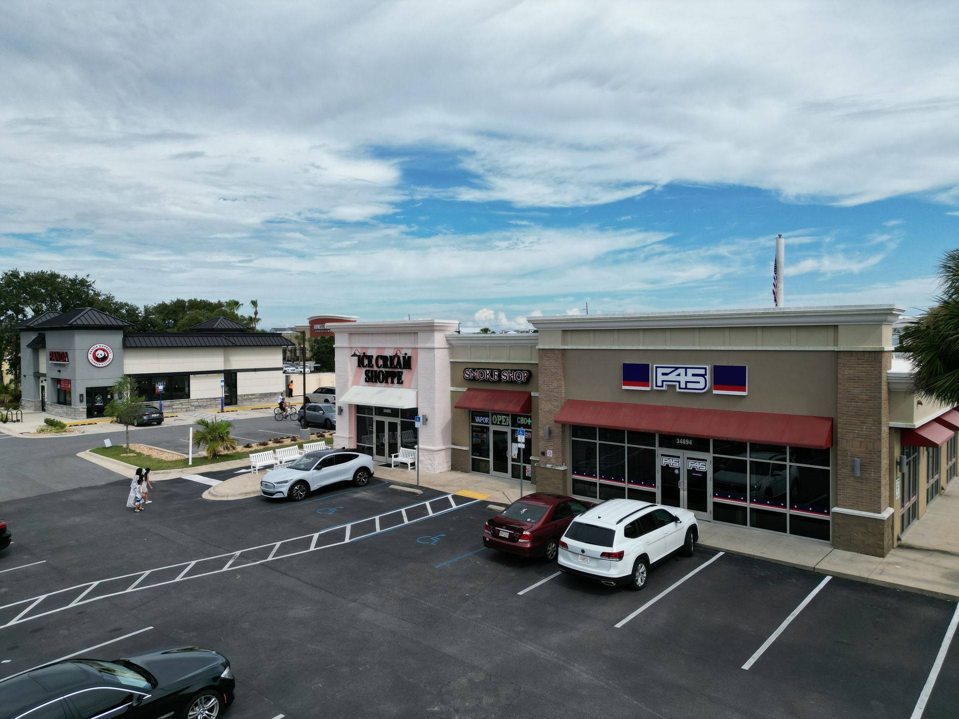 Destin Suite 3, a Parking Lot With Several Businesses | Lindner Properties