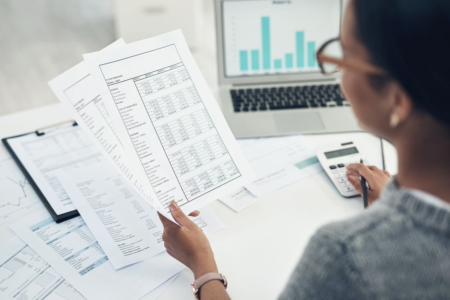 A Business Owner Reviews Expense Reports. Learn How to Calculate Your Own Labor Costs.