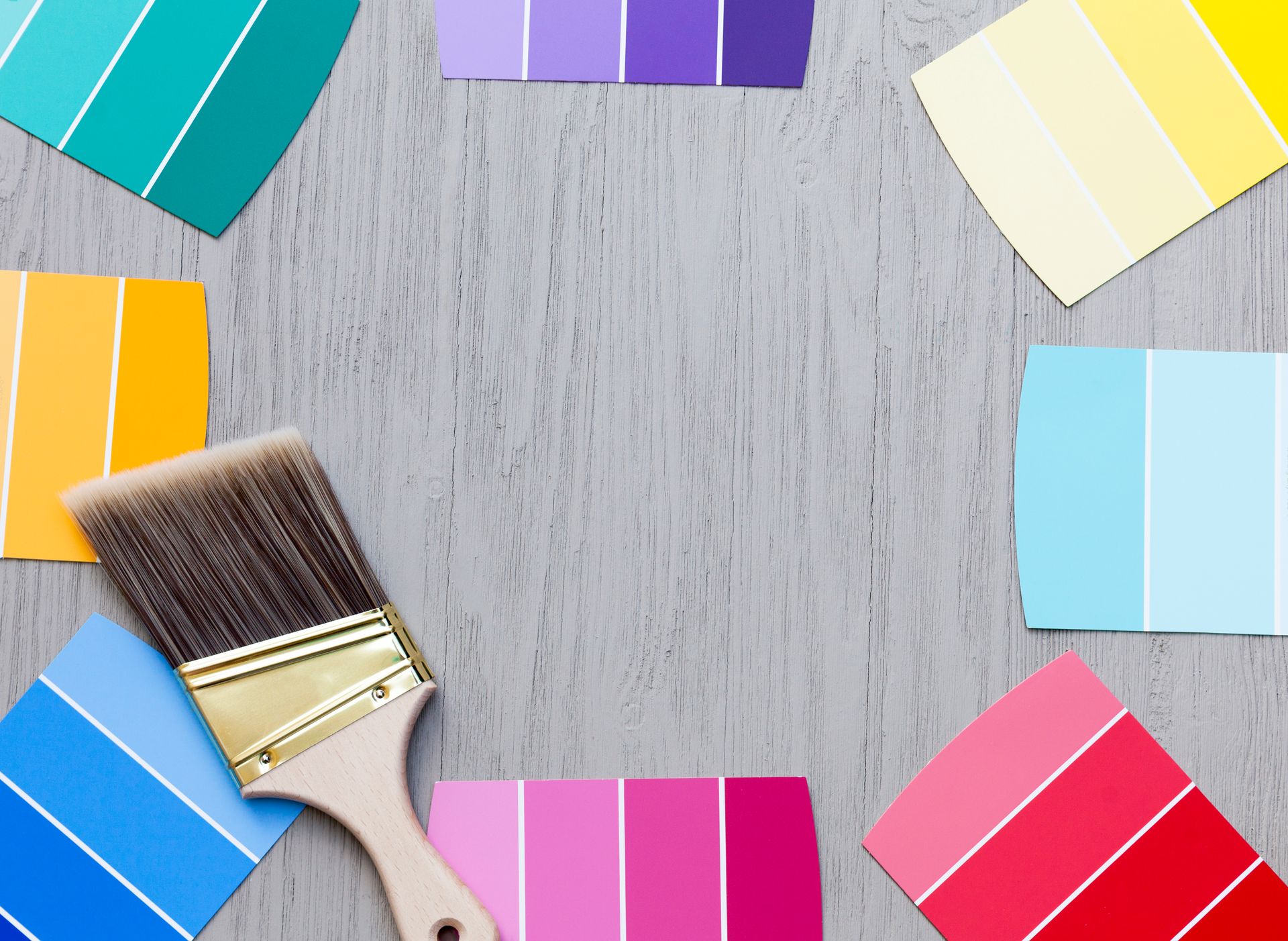 Paint colour swatches and brush used for colour selection and planning
