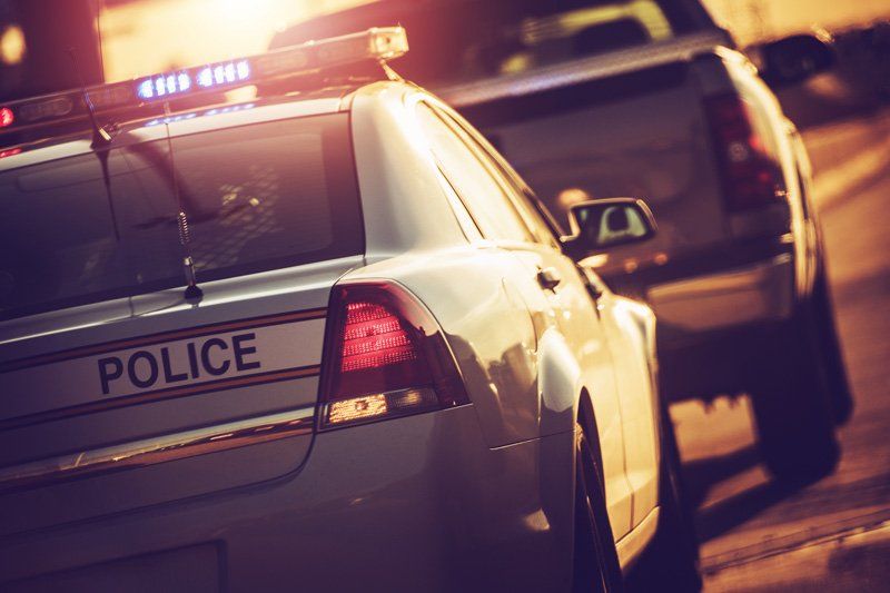 Stock image of police stopping a car.