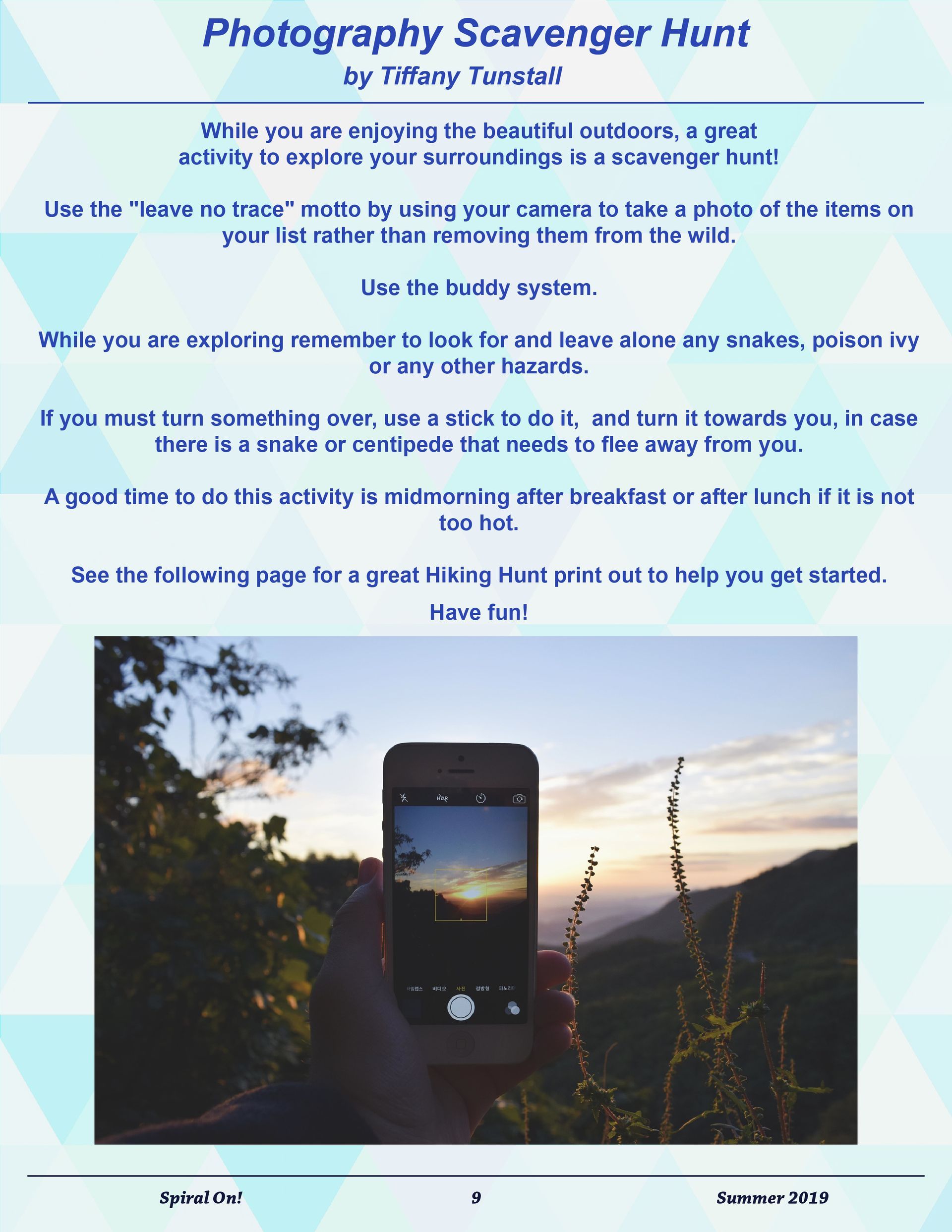 A poster for a photography scavenger hunt with a picture of a cell phone, Summer 2019 magazine.