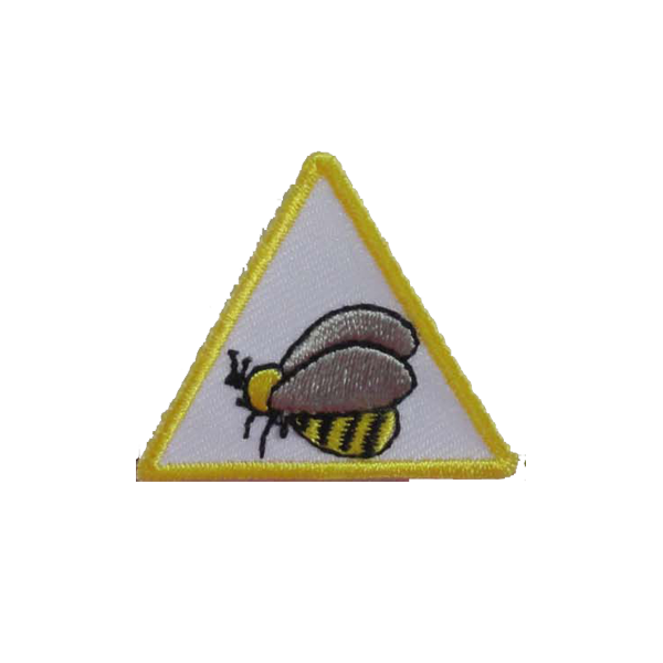 A yellow and white triangle with a bee on it badge.
