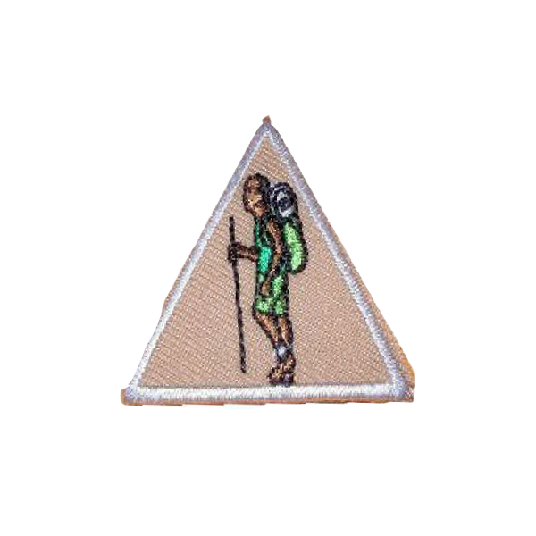 A patch of a person with a backpack and hiking poles badge.