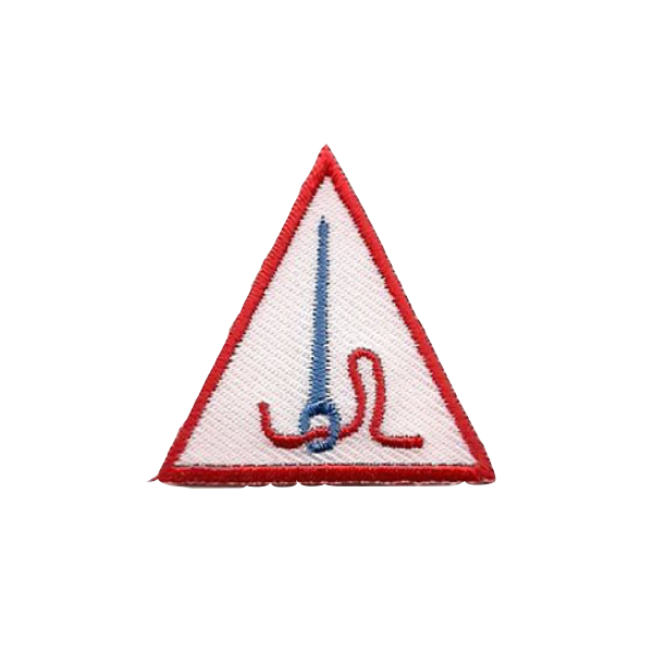 A red white and blue triangle with a needle in it badge.