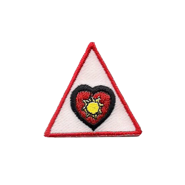 A red and white triangle with a heart and sun on it badge.